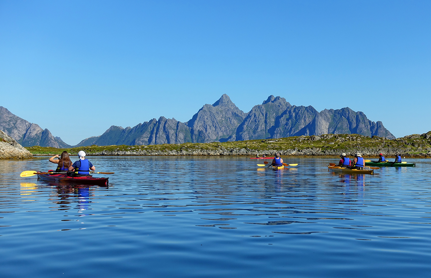 group of tourists on a kayak trip with exploranor