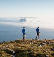 Hikers on the plateau of Hellsegga (Lofoten) Hikers on the plateau of Hellsegga (Lofoten)
